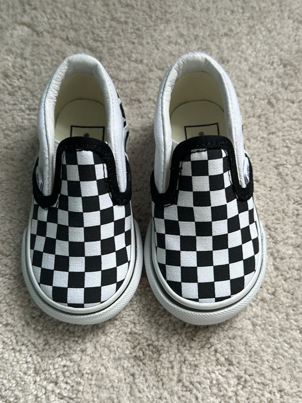 Kids Black & White Checkerboard Slip-On Vans Sneakers